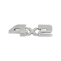 Emblem - under left headlight - "4x2" - 1987-91 Ford Truck